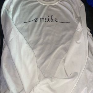 Thin white long sleeve shirt. Never wore.